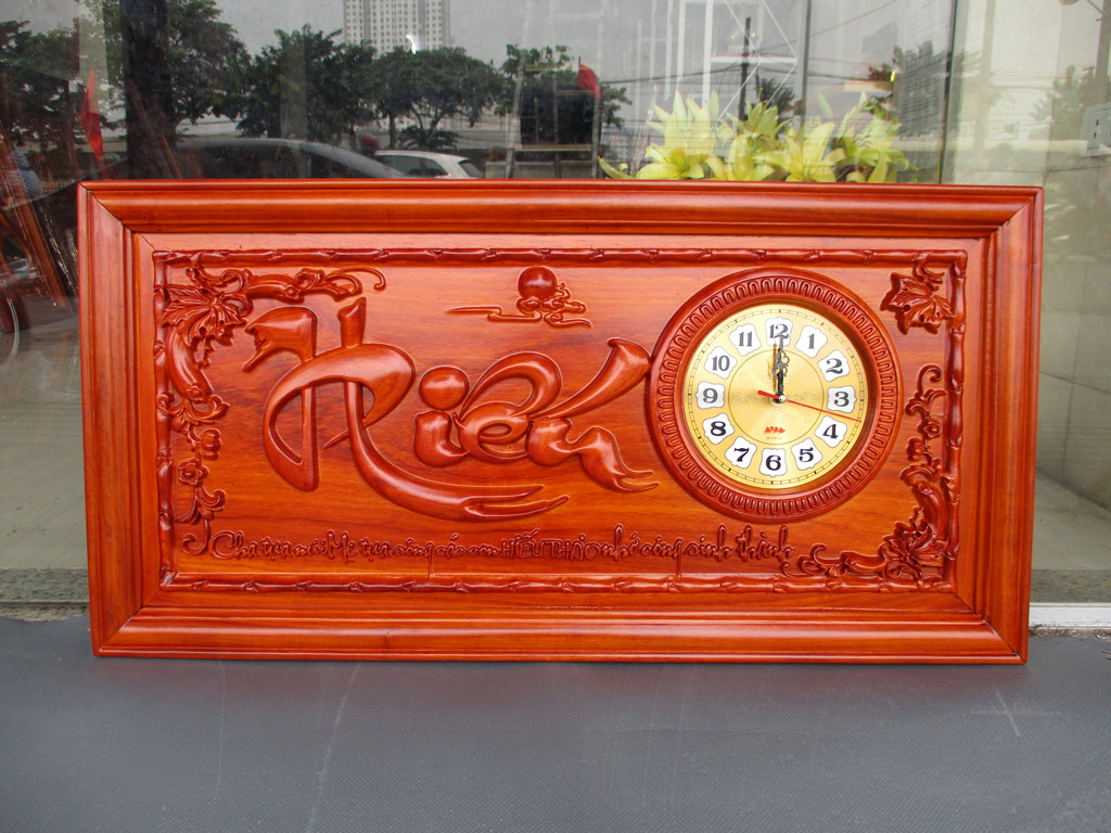 Tranh gỗ đồng hồ chữ Hiếu thư pháp sơn pu 81cm x 41cm - TGPX2298PU